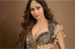 Mouni Roy exudes traditional elegance in a black and gold ajrakh lehenga set